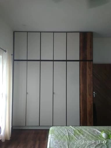 Sliding wardrobe fitted wall to wall
